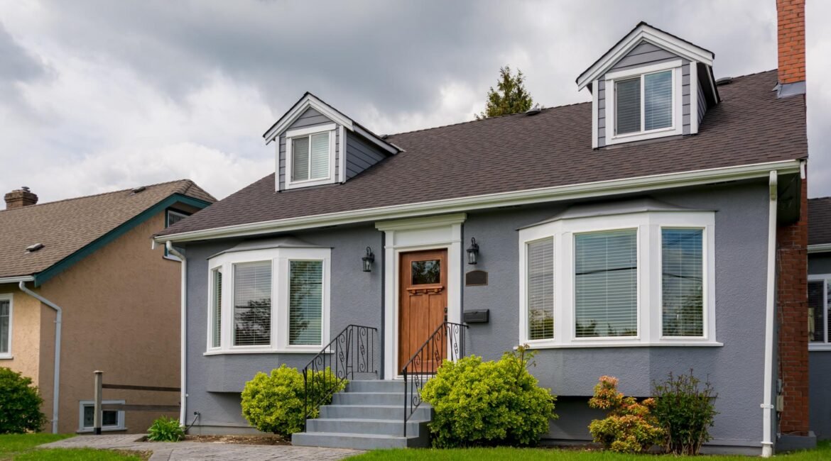 average-residential-house-with-green-lawn-cloudy-day-canada-1